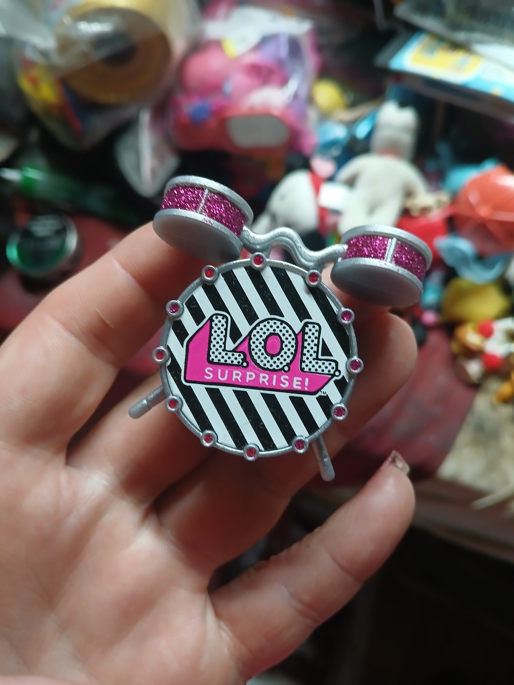 miniature toy drum set accessory from the L.O.L. Surprise! Remix series